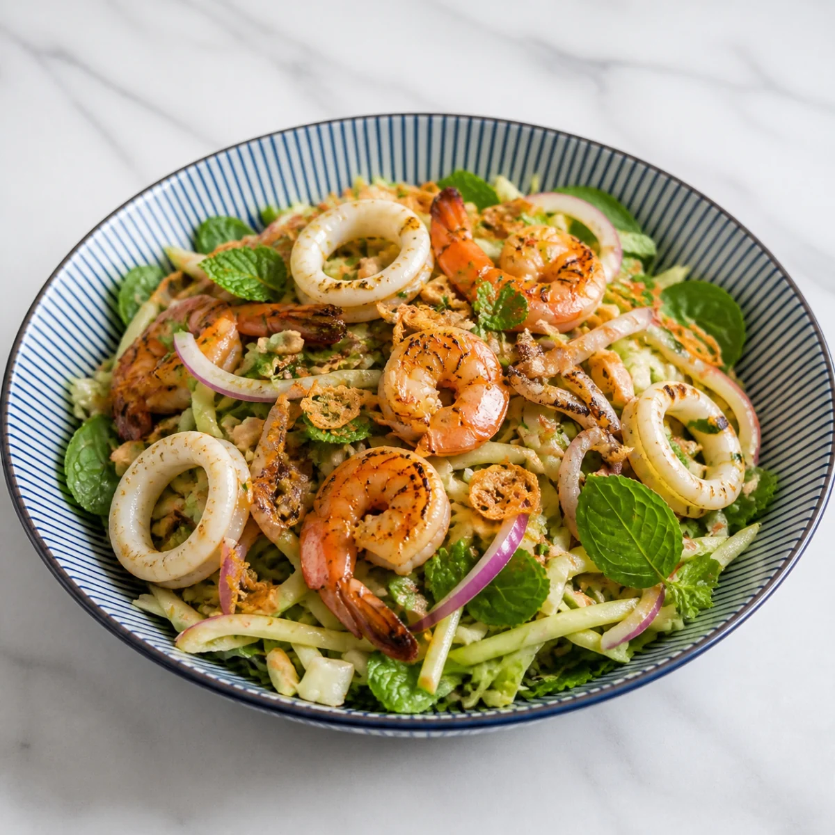 Summer green mango salad with seafood
